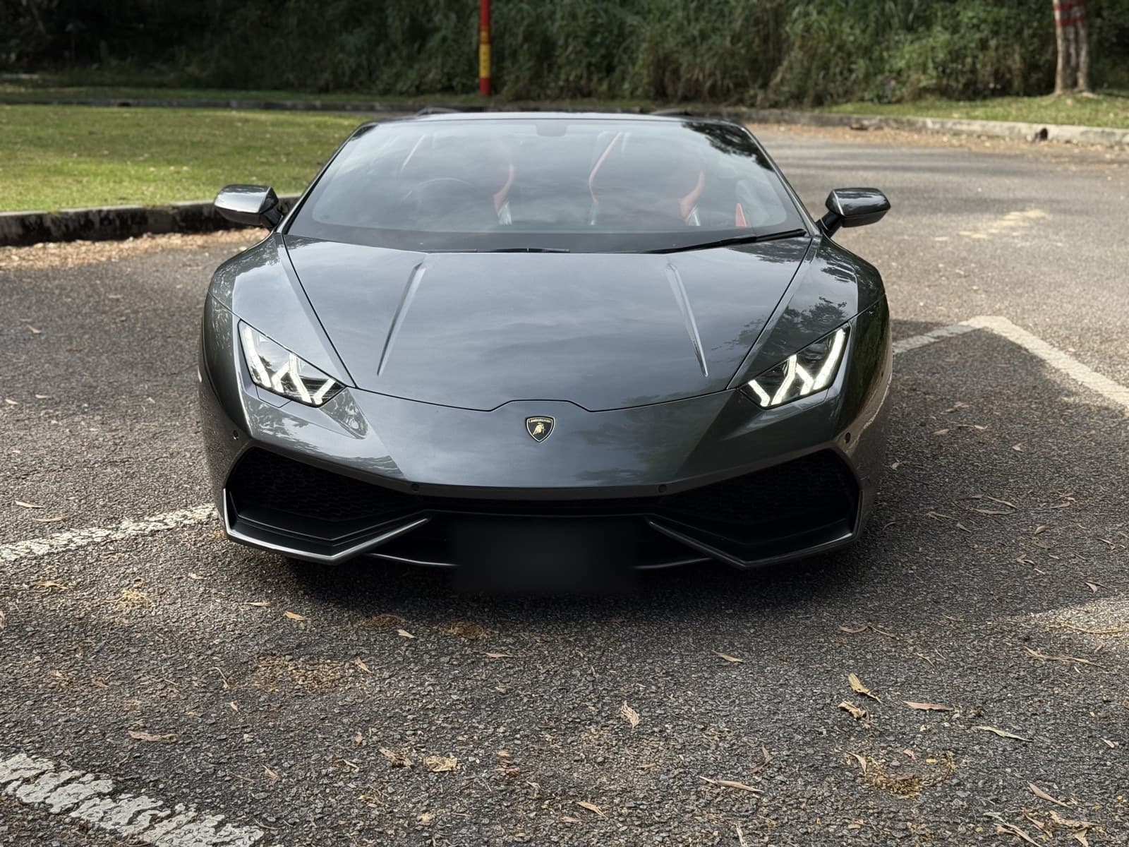 Lamborghini Huracan Spyder available for visitor self-drive hire in Kuala Lumpur, used for photoshoot & honeymoon hire