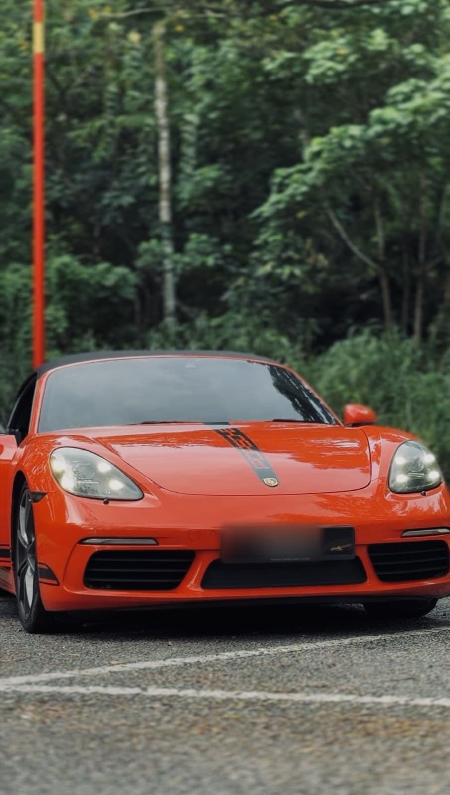 Porsche 718 Boxster available for visitor self-drive hire in Malaysia, recommended for the Kuala Lumpur to the Melaka Coast drive